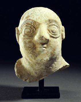 A Sumerian Limestone Head Of A Worshipper