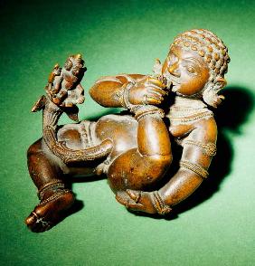A South Indian Bronze Figure Of Vatapattrasayin, Vishnu In His Incarnation As Krishna, Depicted As A
