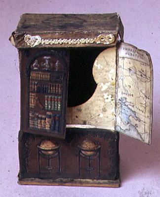 Doll's house furniture: Cardboard bookcase, embossed inside showing a map with the new Australian go from 