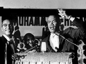Malcolm X during a speech during a rally of Nation of Islam at Uline Arena, Washington, photo by Ric