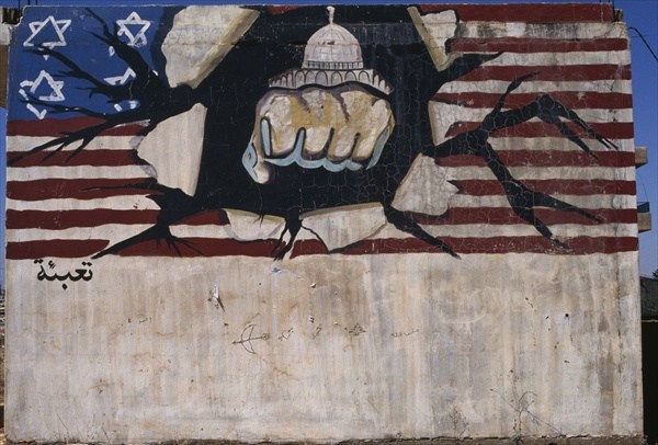 Mural depicting the Hezbollah punching the American flag (colour photo)  from 
