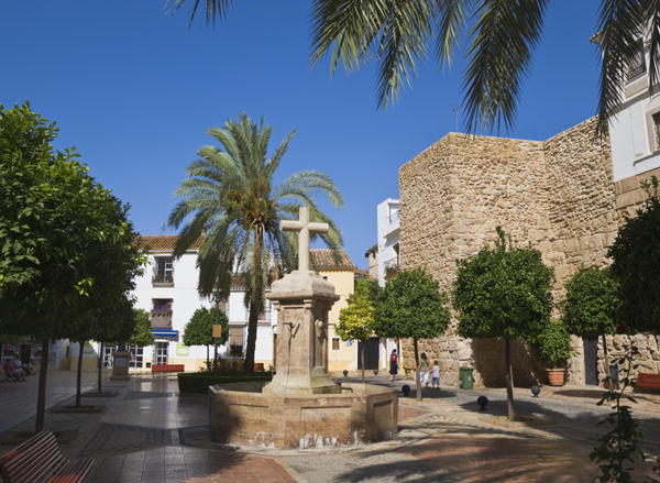 Plaza de Santa Maria de la Encarnacion and section of old city walls, Marbella, Malaga, Costa del So from 