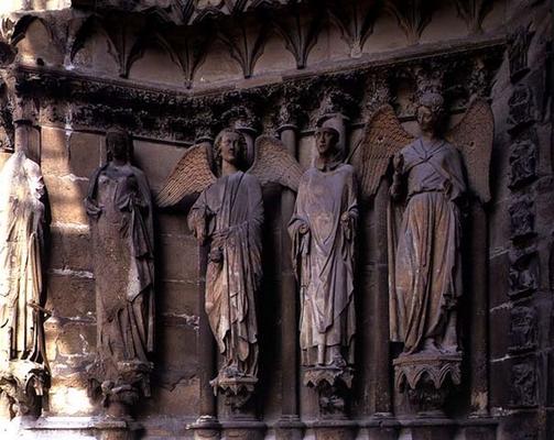 St. Nicaise flanked by two angels, sculptures on the exterior West Facade, 14th century originals (s from 