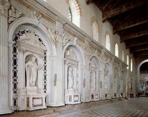 Statues of six apostles decorating the side wall of the nave (photo) from 