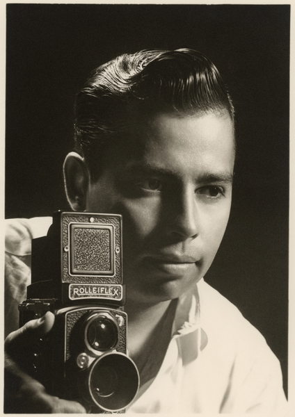 Orlando Suero portrait with Rolleiflex camera, c from Orlando Suero