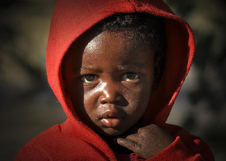 The Boy in Red Coat in Namibia