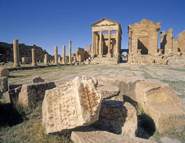 View of the forum with the temples of Jupiter, Juno and Minerva, Sufetula (photo)  from Roman
