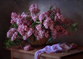 With a basket of lilacs