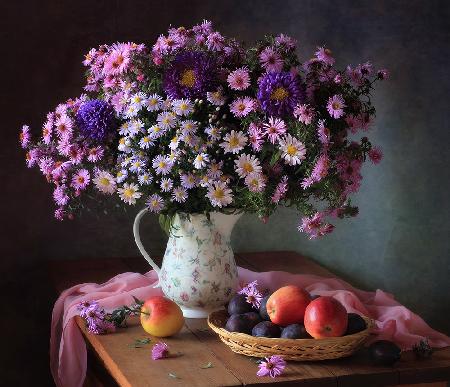 Still life with a bouquet of chrysanthemums and fruits