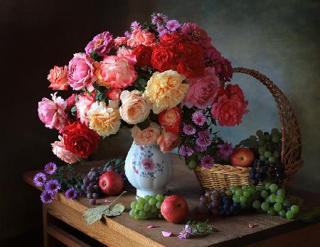 Still life with autumn roses and grapes
