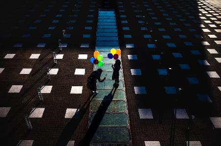 Balloons in the shadow