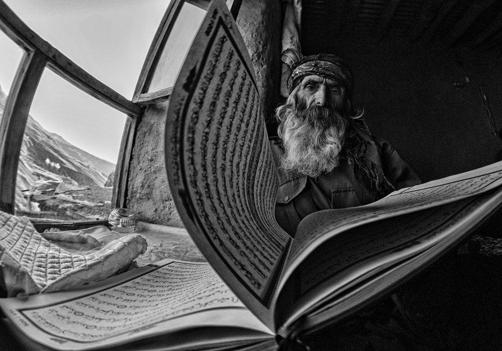 Old men he is reading from Timur Türkmen