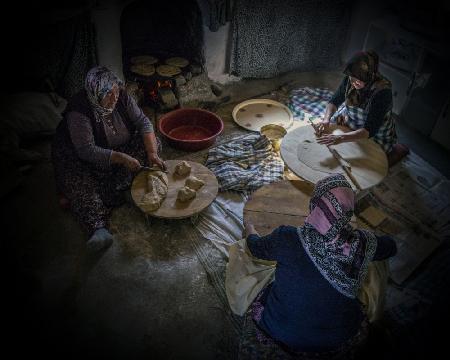 Women making bread.